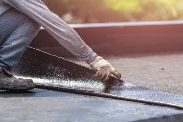 Professional Basement Waterproofing technician working in Mitchell, IL